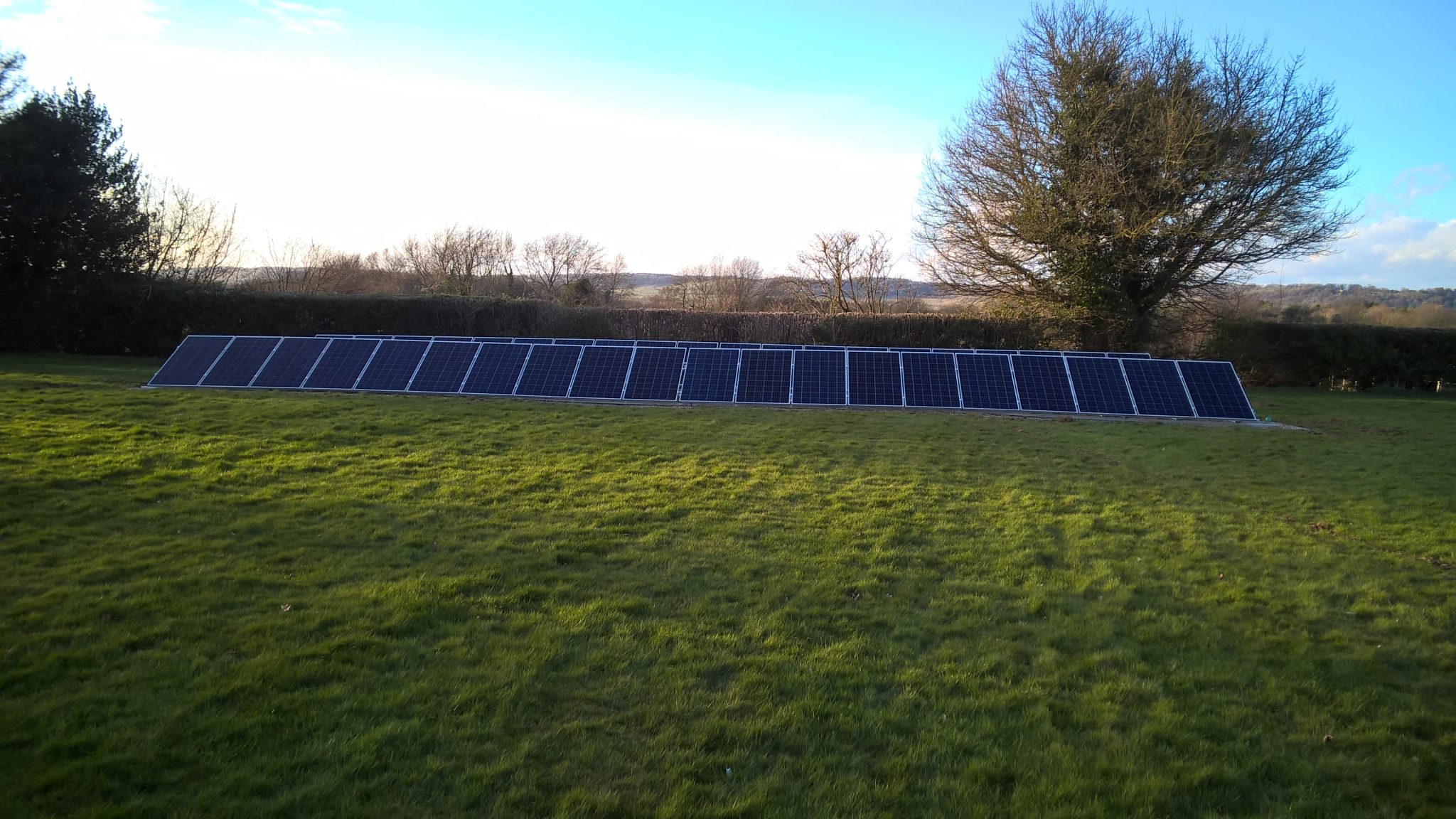 An 11 kWp photovoltaic array ground mounted PV array supplying a large ...